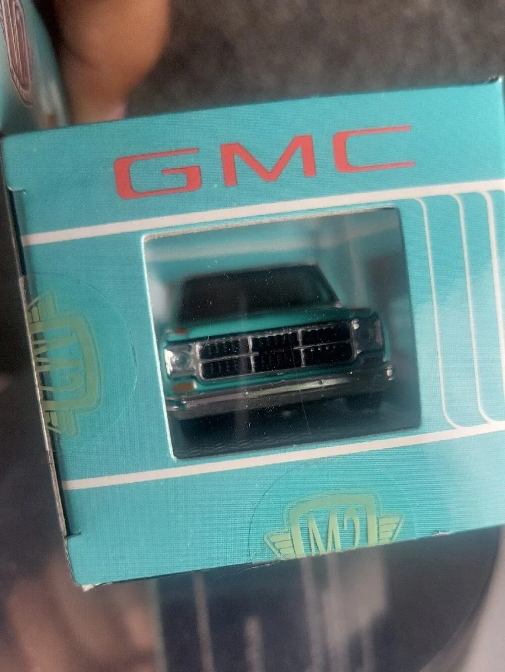 M2 Machines GMC Sierra Grande 15 Die-Cast Truck in Turquoise & White